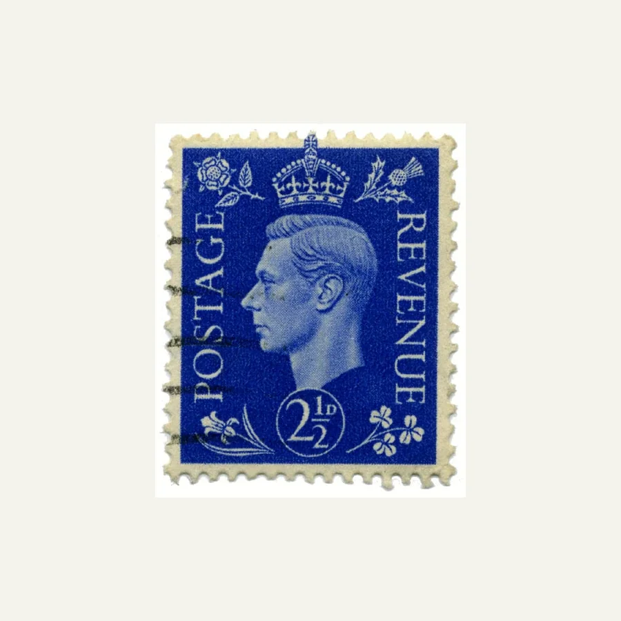 Genuine blue British George VI 2½d stamp scan with left-facing portrait, POSTAGE REVENUE lettering and dark cancellation at left