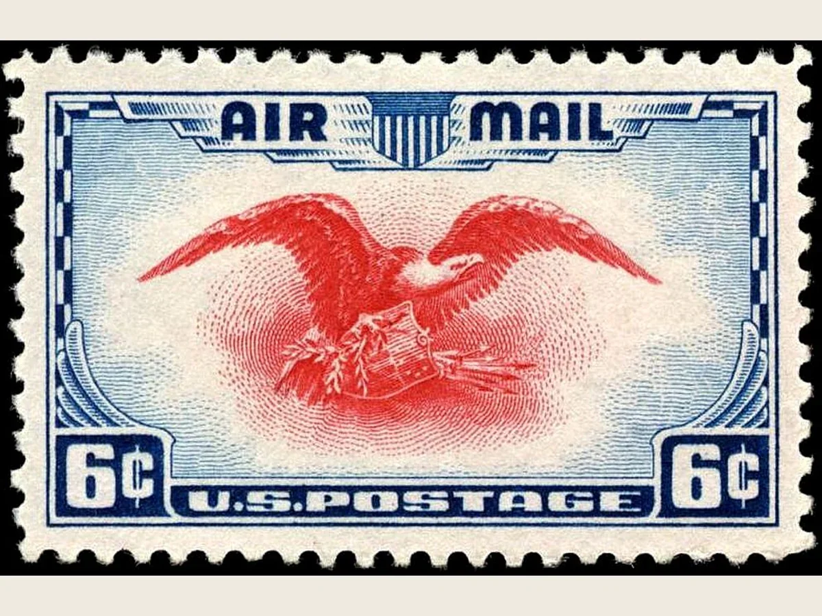 Echter Scan der US-Luftpostmarke C23 von 1938 mit rotem Adler, Schild, blauem Rahmen und sechs Cent Nennwert