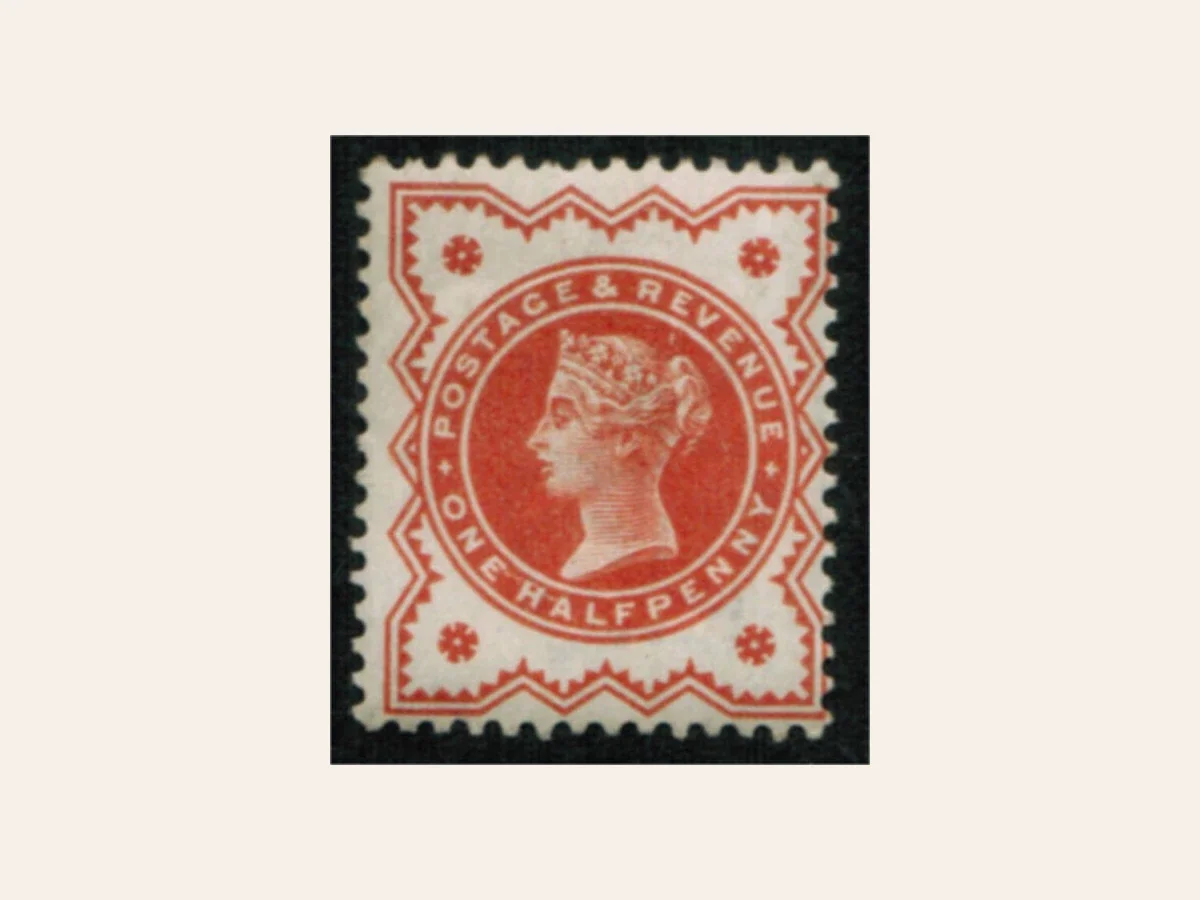 Actual scan of a vermilion Queen Victoria halfpenny Jubilee stamp with its full perforated edges