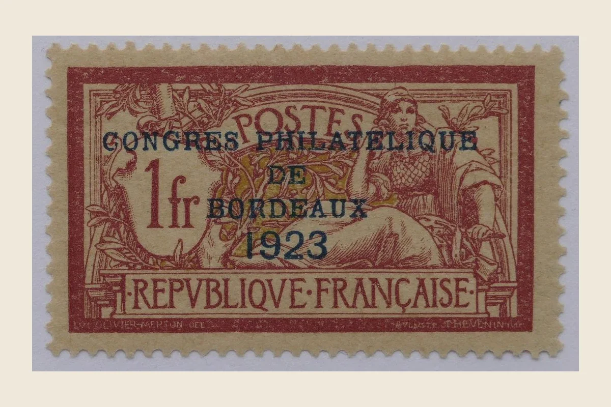 Genuine 1f Merson reference scan with blue CONGRES PHILATELIQUE DE BORDEAUX 1923 overprint on a wine-red design