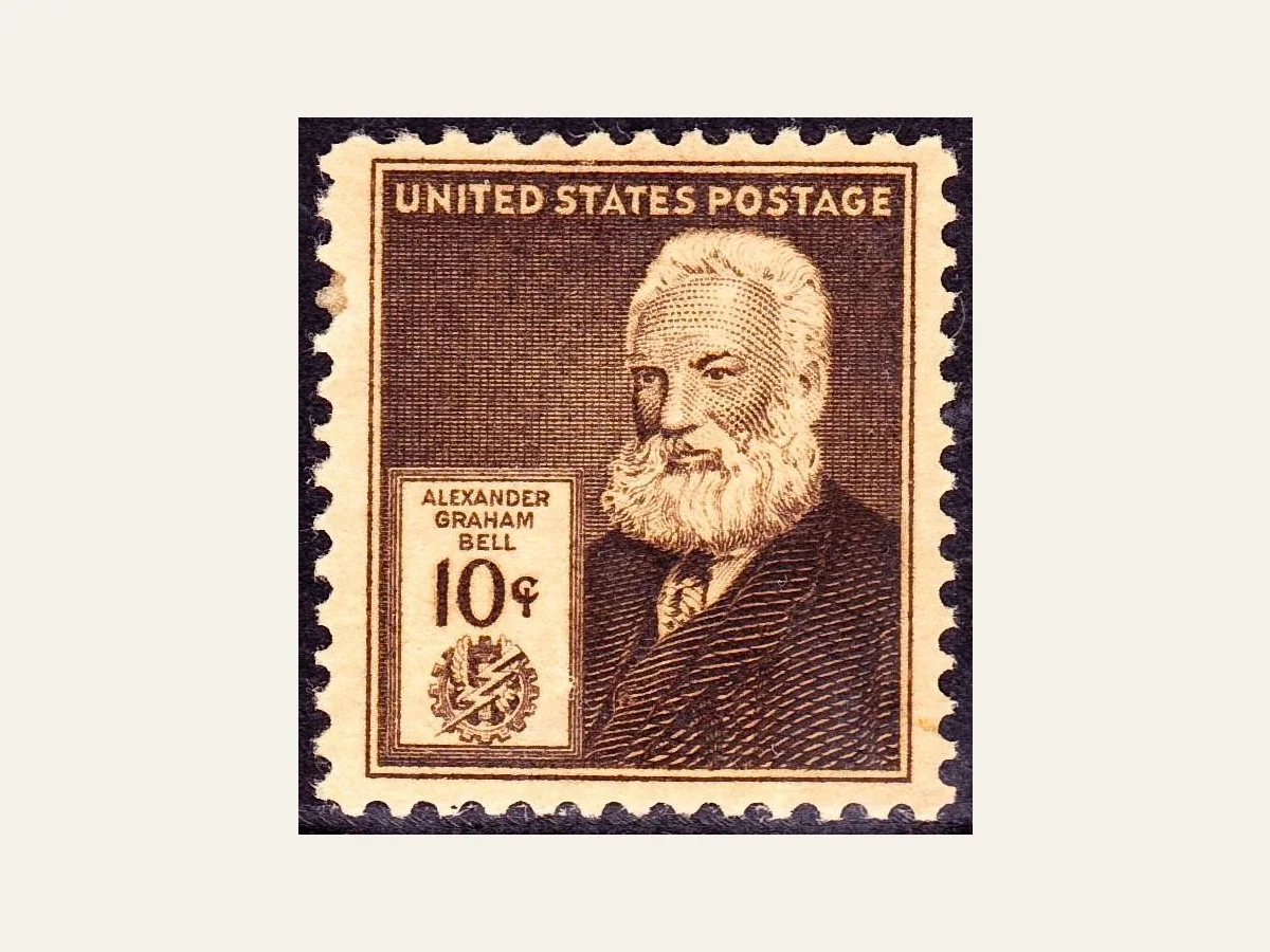 Actual brown 1940 Alexander Graham Bell stamp, 10-cent denomination, name panel and inventor emblem